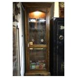 Tall oak display cabinet