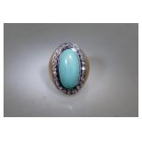 A Fine Cabochon Turquoise and Diamond Ring