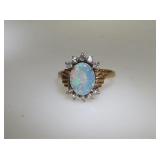 18kt gold Cabochon opal and diam ring