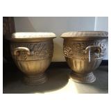 Pair antique cast iron garden urns
