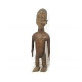 Yoruba wood carved figure with scarification