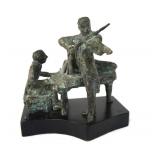 A Bronze Sculpture of a two piece violin & piano