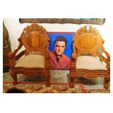 Pair highly carved Indonesian Lion arm Chairs