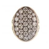 A 14K white gold ring centering an elongated oval