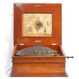 Regina music box in oak case - 19th cent.