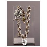 STERLING SILVER CHARM BRACELET