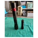 2 Flashlights 1 Needs Batteries & 1 New Batteries