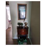 Side Table with Assorted Home Decor and Framed Picture