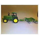 John Deere 4850 New Orleans 7-82 Collector Series with Disc - Ertl - 27”x11”