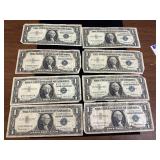 8 1957 Blue Seal US $1 Silver Certificates