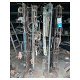 (2) ROTATING SHOP RACKS W/ CONTENTS