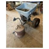 FERTILIZER SPREADER AND METAL GAS CAN