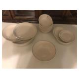 11 dinner plates, 10 saucers, 13 bowls, serving