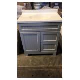 Gray vanity with sink