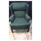 Green wingback chair