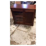 Cabinet with casters has swivel top