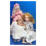 3 old dolls