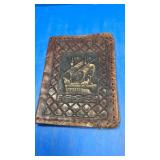 Vintage leather book cover with ship