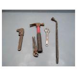 Flat with Pipe wrench, hammer,lug nut wrench etc