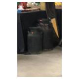 Milk and cream cans bottoms are rusty