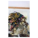 Container of costume jewelry Container of costume jewelry