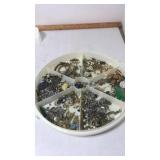 Container of costume jewelry Container of costume jewelry