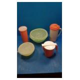 5 tupperware containers 1 strainer 3 mugs and 1