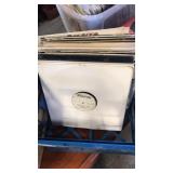Assorted records in tote Assorted records in tote