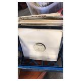 Assorted records in tote