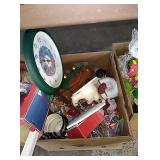 Box of Christmas decor, clock, and more