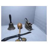 Flat with iron, bell, belt, and a marocco