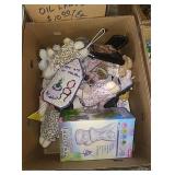 Box with welcome sign, garden fairy, dolls and