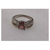 Sterling silver ring with red gem
