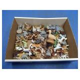 flat of small glass figurines