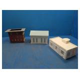 3 plastic buildings