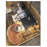 Box with knives, lamp, iron, and more