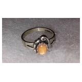 Size 4.75 sterling silver ring with orange gem