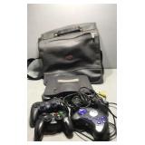 Nintendo 64 game system w bag and 4 controllers