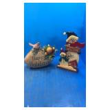 Happy holidays rock and welcome snowman