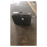 Samsonite suitcase on wheels