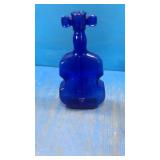 Blue violin bottle