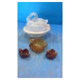 Swan on nest 3 others