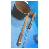 Rusty bucket. Machete. Bug sprayer