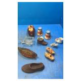 Pig bank. Canoe. Shoes