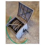 Garden hose on enclosed storage reel : Turns