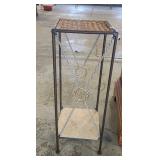 Wicker and metal plant stand