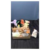 9 ty babies. Bears,mouse, dogs more