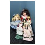 6 assorted porcelain dolls