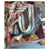Box of woven rugs