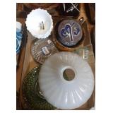 Flat with lamo shade, glass bottle, and green